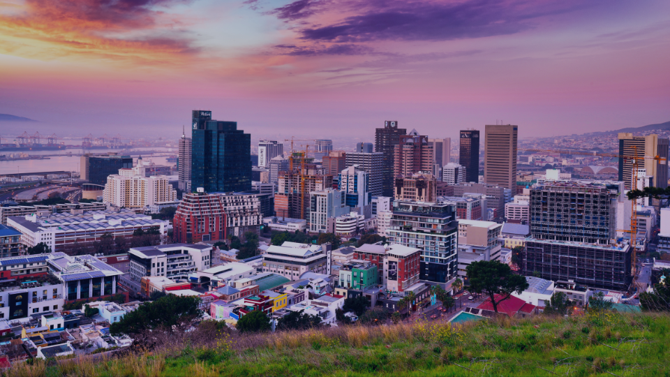Cape Town cityscape at sunset, showcasing South Africa’s financial district.